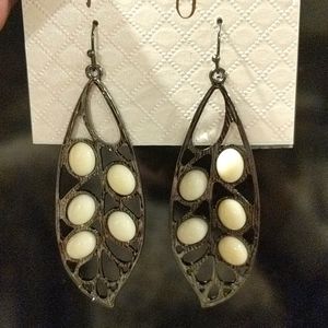 One pair of twenty 28 earrings